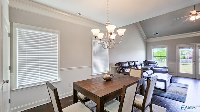 7607 NW Ashor Dr, Huntsville, AL 35806 - dining space featuring crown molding, dark wood-style flooring, a chandelier, and ceiling fan