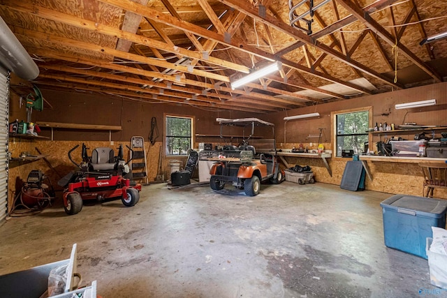 garage with a workshop area