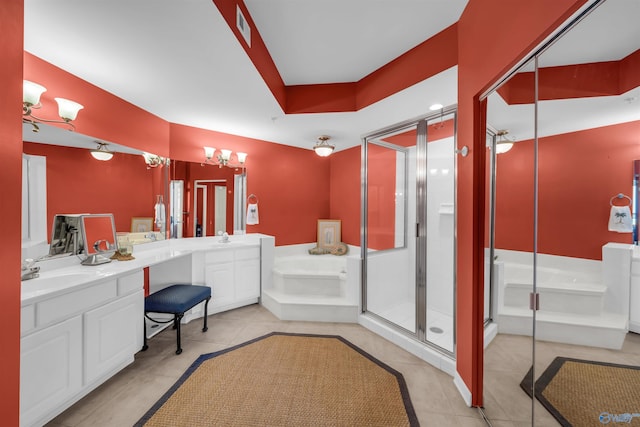 full bathroom featuring visible vents, a sink, a garden tub, and double vanity