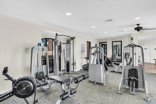 gym with baseboards, carpet floors, visible vents, and recessed lighting