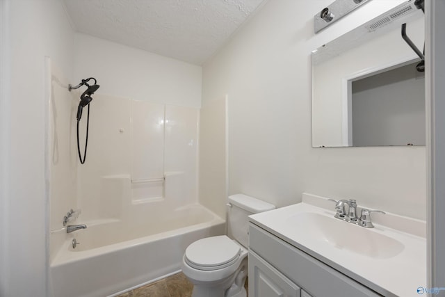 bathroom featuring a textured ceiling, visible vents, shower / bathtub combination, toilet, and vanity
