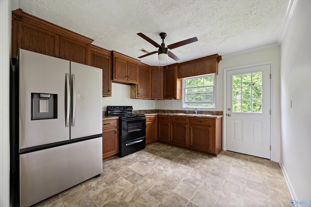 kitchen featuring fridge with ice dispenser, a sink, ceiling fan, black range with electric stovetop, and ornamental molding