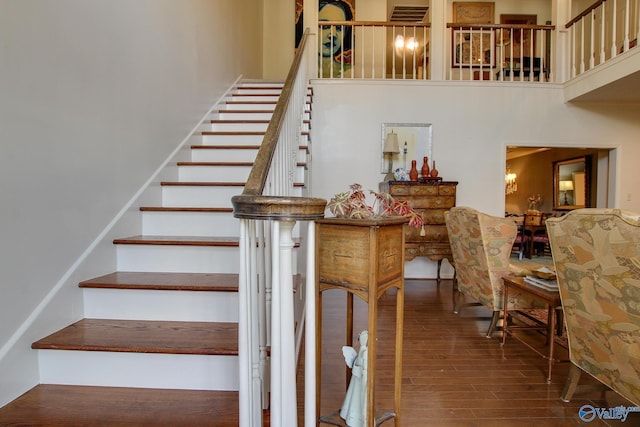 1625 River Bend Pl SE, Decatur, AL 35601 - stairs featuring a high ceiling and wood finished floors