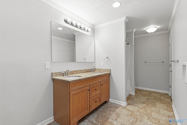 bathroom with vanity and crown molding