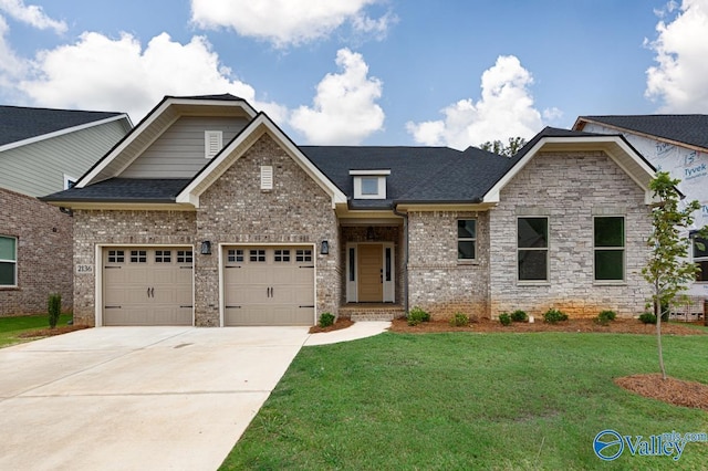 craftsman inspired home with a front lawn