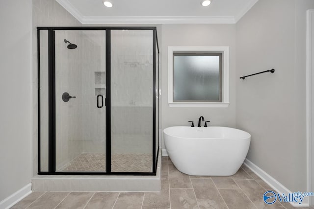 bathroom featuring crown molding and independent shower and bath