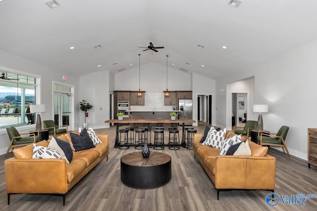 living room featuring wood-type flooring, high vaulted ceiling, and ceiling fan