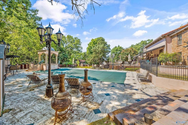 view of pool with a patio