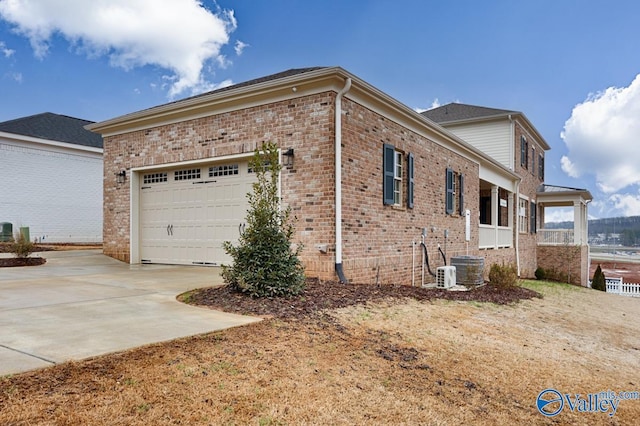 view of side of home with a garage