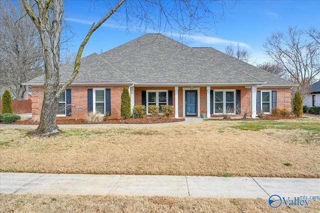 single story home with a front yard