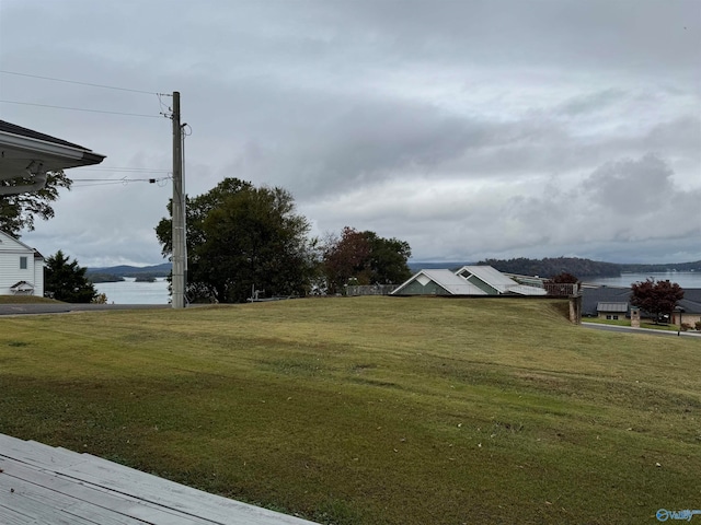 view of yard with a water view