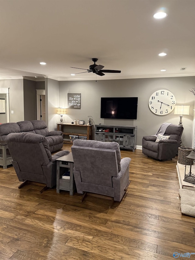 living room with hardwood / wood-style flooring and ceiling fan