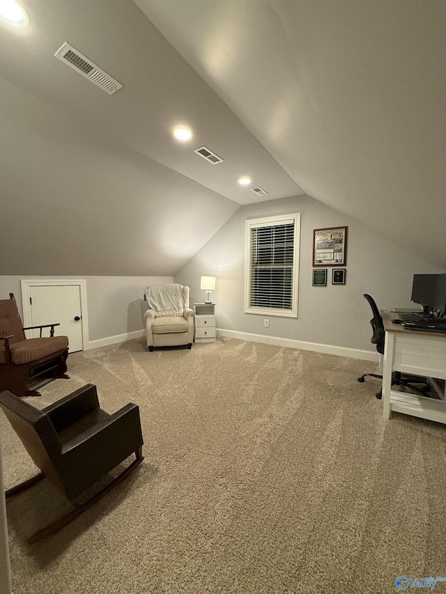 office area featuring lofted ceiling and carpet flooring