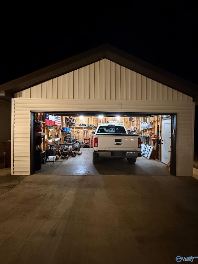 view of garage at night