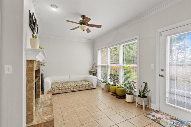 208 Honor Way, Madison, AL 35758 - living room featuring light tile patterned floors, ceiling fan, a fireplace, and ornamental molding
