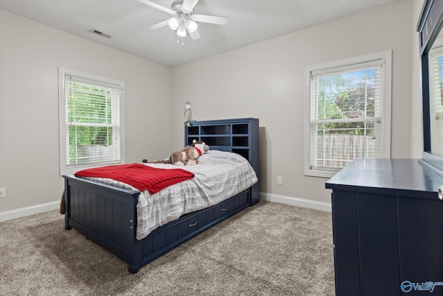 208 Honor Way, Madison, AL 35758 - bedroom featuring light colored carpet, baseboards, and a ceiling fan