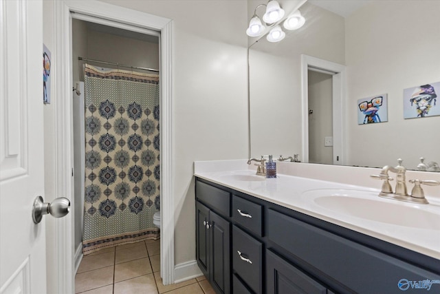 208 Honor Way, Madison, AL 35758 - full bathroom with double vanity, toilet, tile patterned floors, a shower with curtain, and baseboards