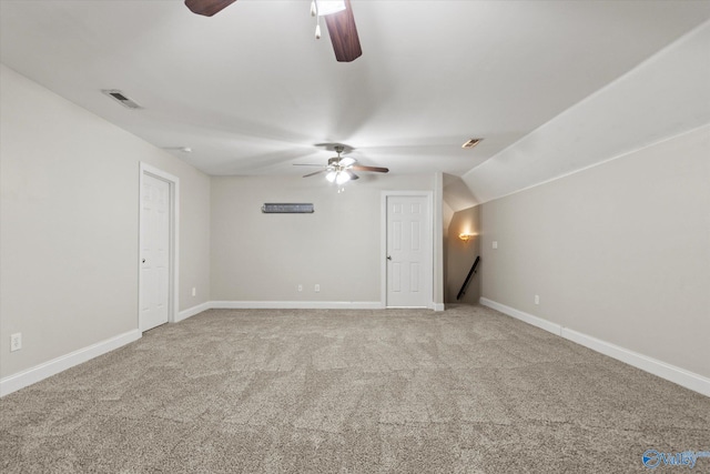 208 Honor Way, Madison, AL 35758 - empty room featuring a ceiling fan, light colored carpet, baseboards, and lofted ceiling