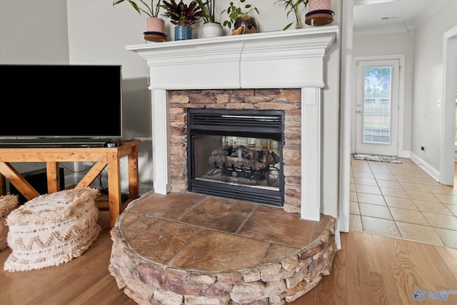 208 Honor Way, Madison, AL 35758 - detailed view of crown molding, a fireplace, and wood finished floors