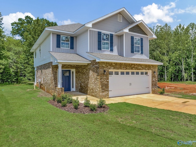 craftsman inspired home featuring a garage and a front lawn