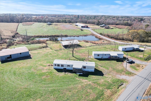 bird's eye view with a water view and a rural view