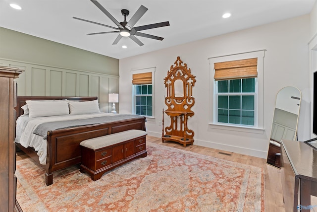 bedroom with visible vents, recessed lighting, light wood-style floors, baseboards, and ceiling fan
