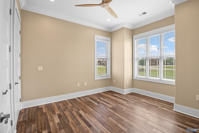 empty room with recessed lighting, ornamental molding, dark wood-style flooring, and a wealth of natural light