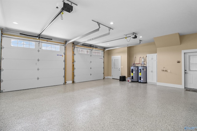 garage with baseboards, a garage door opener, and electric water heater