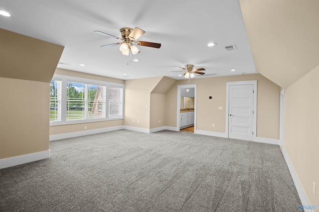 additional living space featuring visible vents, recessed lighting, ceiling fan, and carpet floors