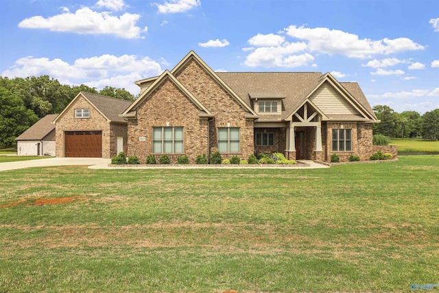 craftsman-style house with a shingled roof, a front yard, driveway, and brick siding