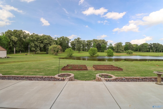 view of patio featuring a water view