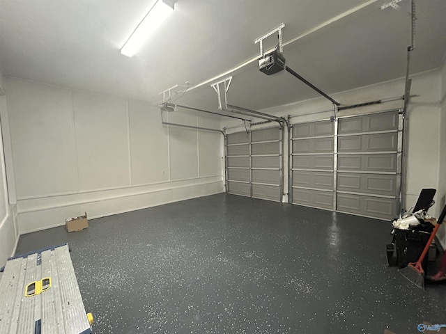 garage featuring a garage door opener