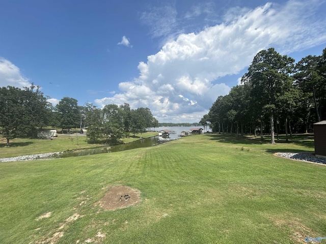 view of yard with a water view