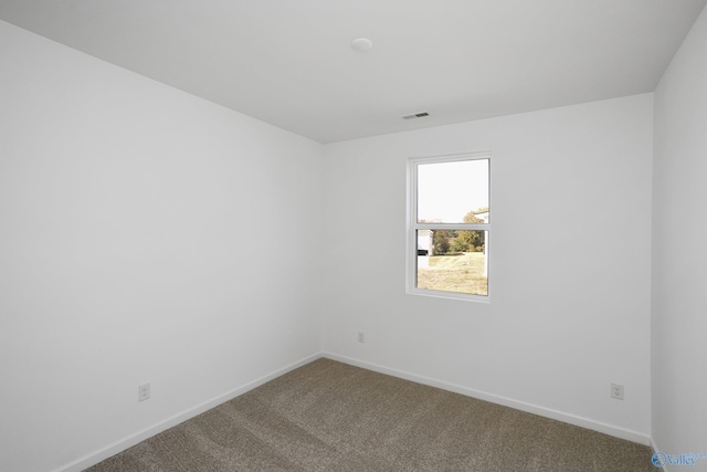 empty room featuring carpet floors