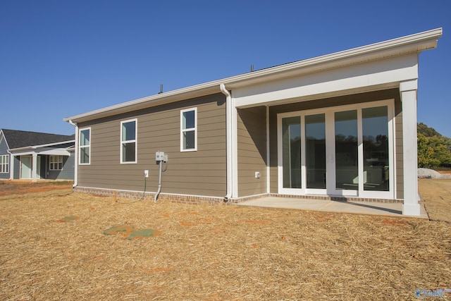 rear view of house featuring a patio area