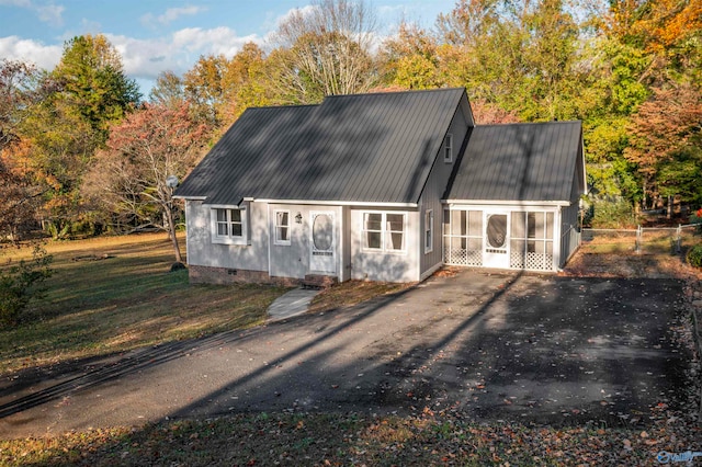 exterior space with a sunroom