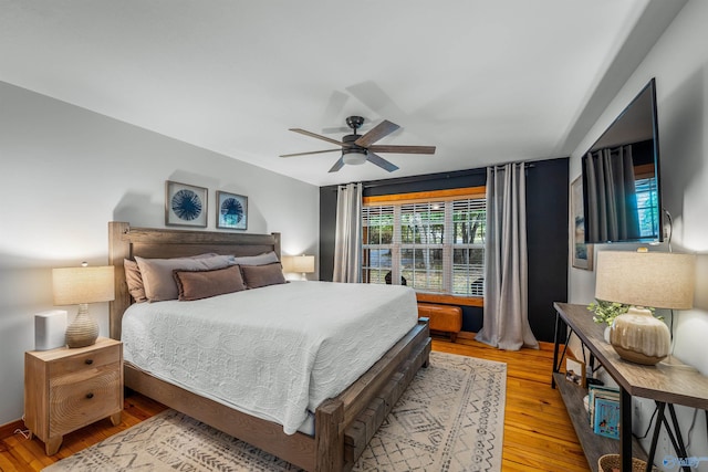 bedroom featuring ceiling fan and hardwood / wood-style floors