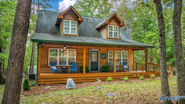 view of front of home with cooling unit and ceiling fan