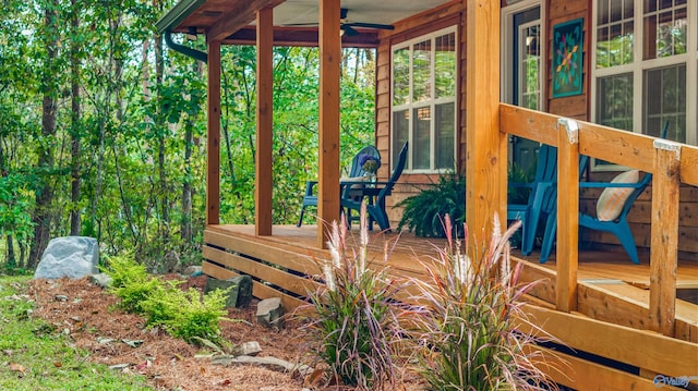 wooden deck with ceiling fan