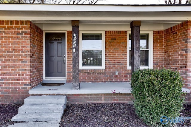 property entrance featuring covered porch