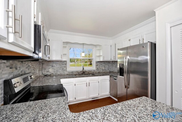 4407 Sparkman Dr NW, Huntsville, AL 35810 - kitchen with white cabinetry, open shelves, light stone countertops, appliances with stainless steel finishes, and a sink