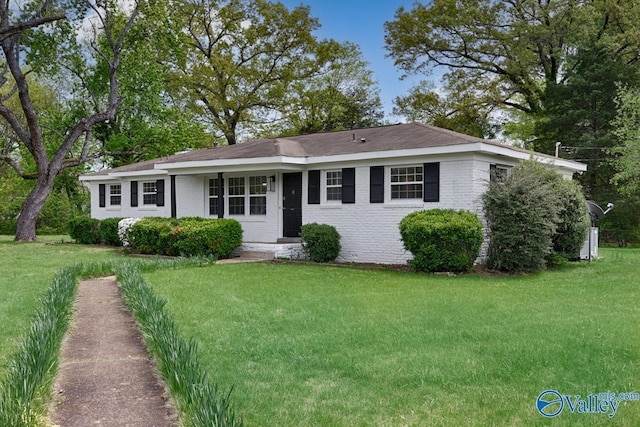 4407 Sparkman Dr NW, Huntsville, AL 35810 - ranch-style home featuring a front yard and brick siding