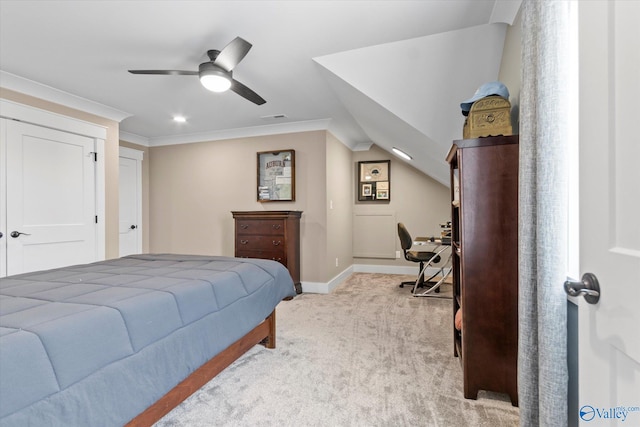 carpeted bedroom with lofted ceiling, ceiling fan, and crown molding