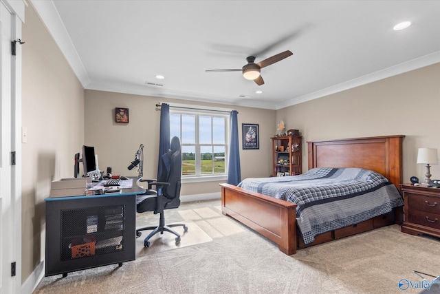 bedroom featuring ornamental molding, light carpet, and ceiling fan