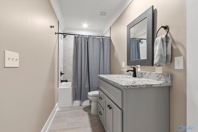 full bathroom with vanity, shower / bath combo, toilet, and tile patterned flooring