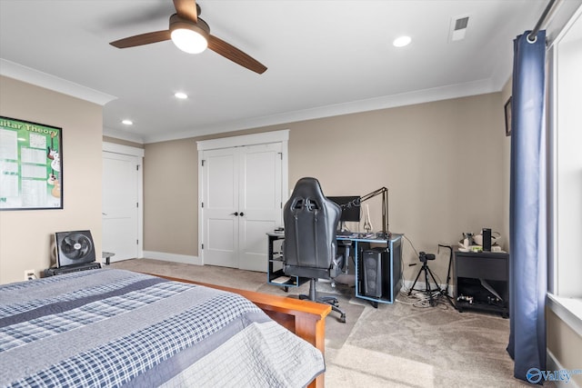 bedroom with light carpet, ceiling fan, and ornamental molding