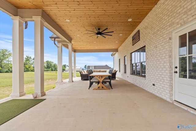 view of patio featuring ceiling fan