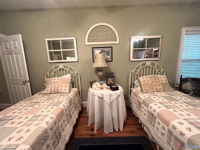 bedroom featuring wood finished floors