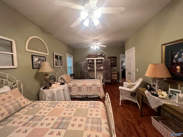 bedroom featuring ceiling fan and hardwood / wood-style floors