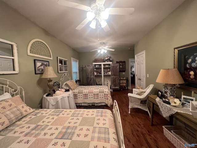 bedroom with ceiling fan and wood finished floors